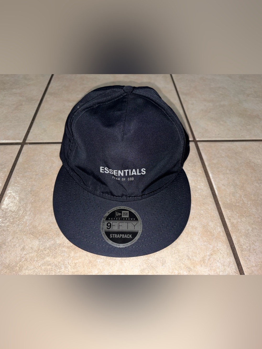 New Era ESSENTIALS Black Strapback Cap